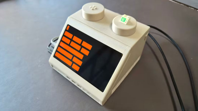The Mac mini was hidden in an expanded LEGO brick designed as a 1970s terminal.